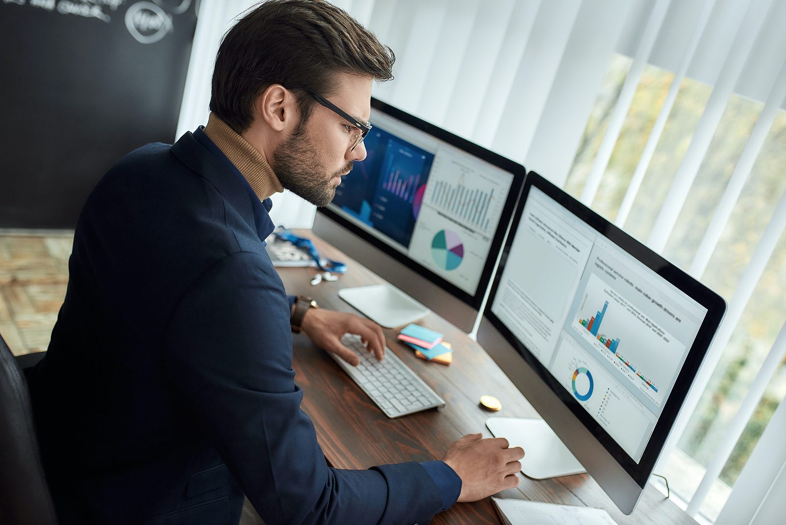 Man studying insurance charts